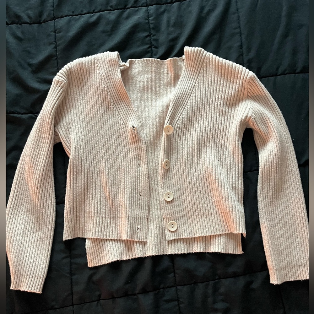 Long sleeve button up top, somewhat cropped
